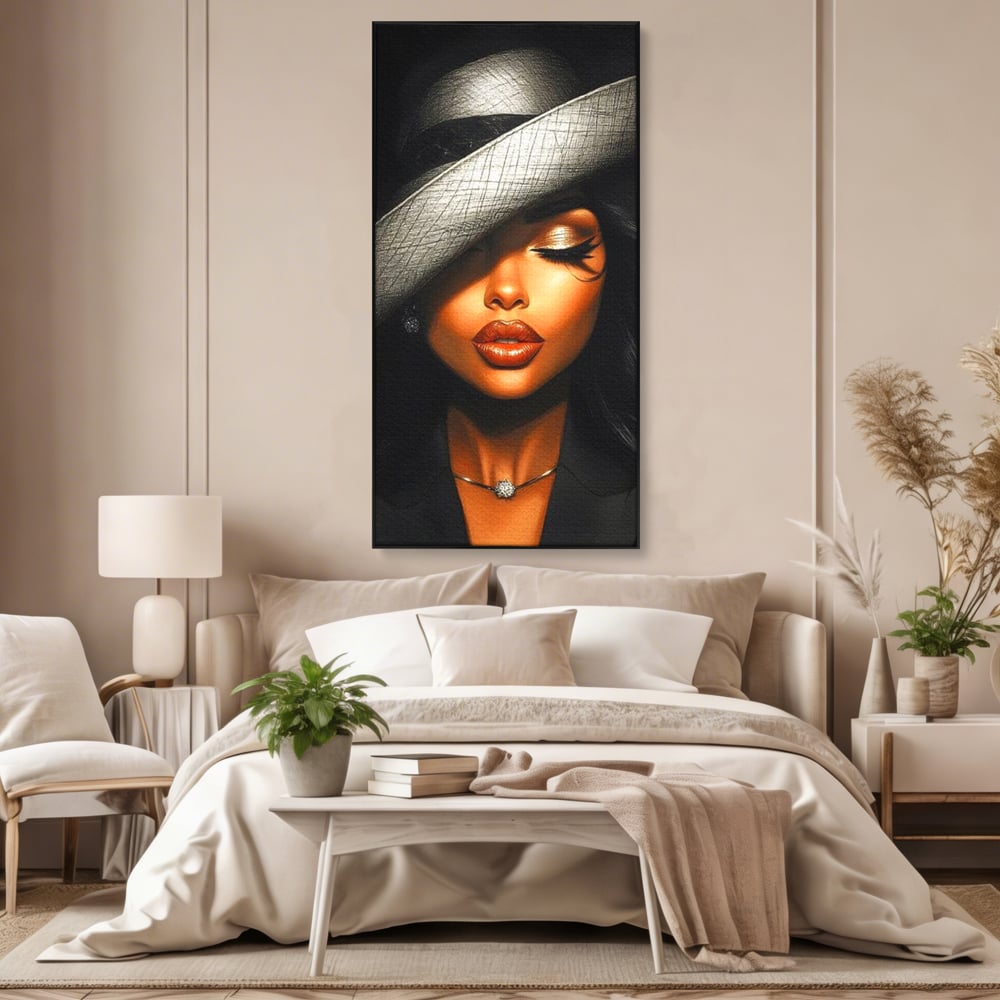 Tablou canvas cu tablou canvas cu femeie si palarie, in rama de aluminiu negru, pe perete intr-un dormitor
